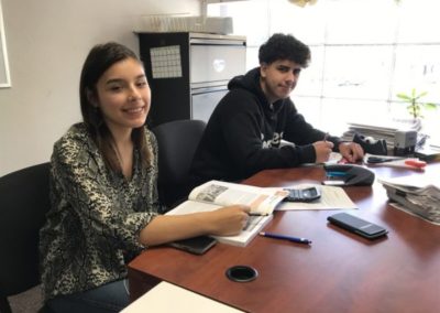 Two Rio Valley students working at a desk