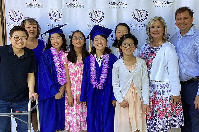 Valley View Charter Prep graduates with their families